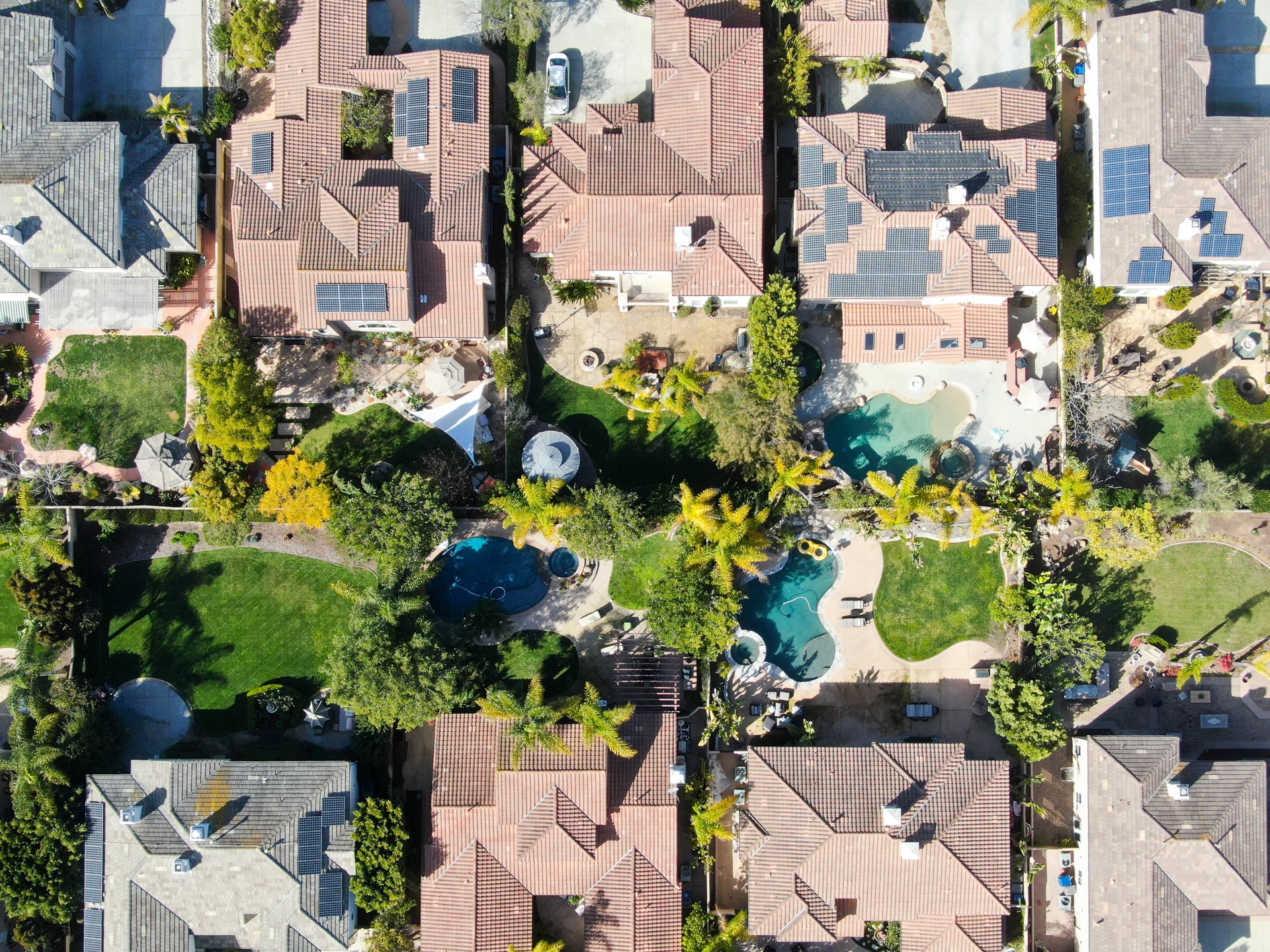 Aerial view suburban neighborhood with identical wealthy villas next to each other. San Diego, California, USA