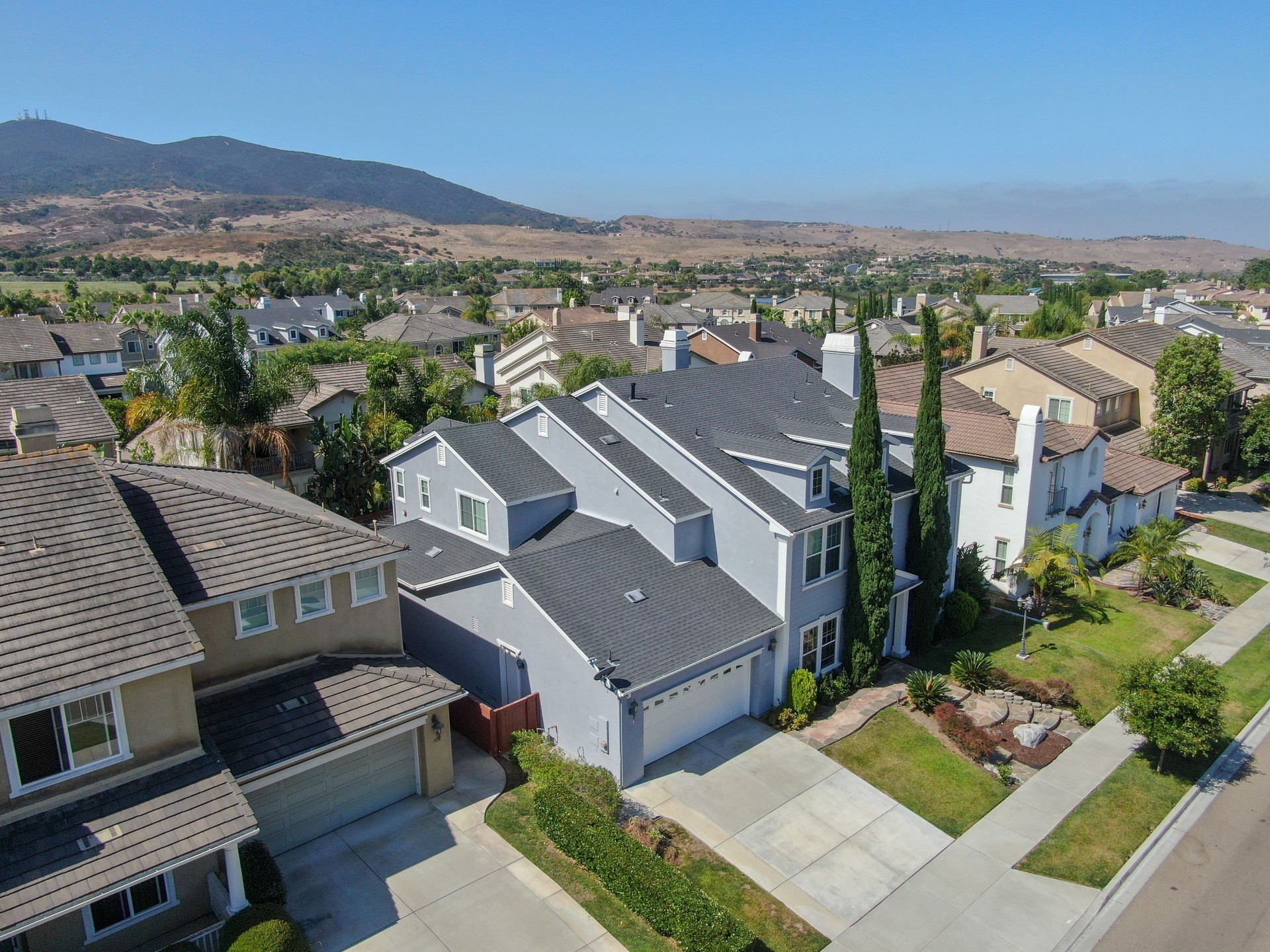 Suburban neighborhood street with big villas, San Diego